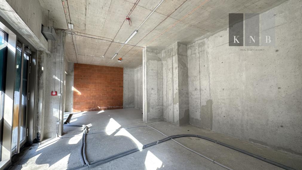 Predaj prízemného obchodného priestoru 62,79 m² v úplne novej rezidenčnej budove na Račianskej ulici v meste Bratislava